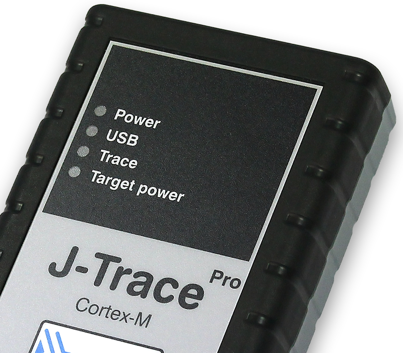 The image shows a rectangular device labeled "J-Trace Pro Cortex-M." It features indicators for Power, USB, Trace, and Target power, along with corresponding status lights. The device has a black exterior with a smooth finish and is used for debugging and development in embedded systems.