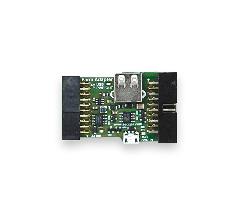 A small green circuit board labeled "Farm Adapter" featuring a USB port and multiple pins. It has components and markings indicating power outputs and connections, useful for interfacing with electronics. The design facilitates communication between different hardware components.